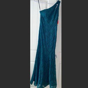 Emerald green one shoulder, mermaid tail prom dress